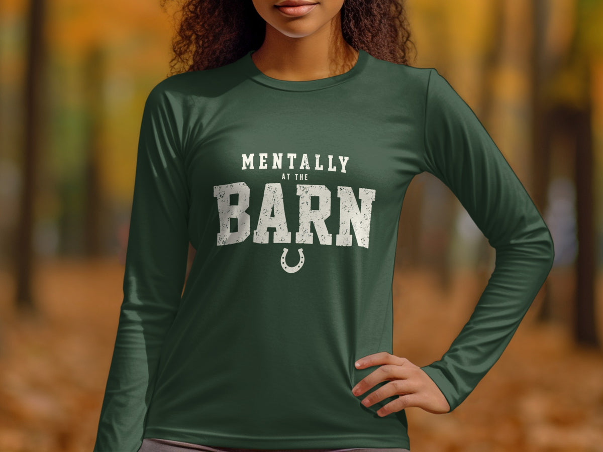 Dark green long-sleeve shirt with white text "Mentally At The Barn" and horseshoe.