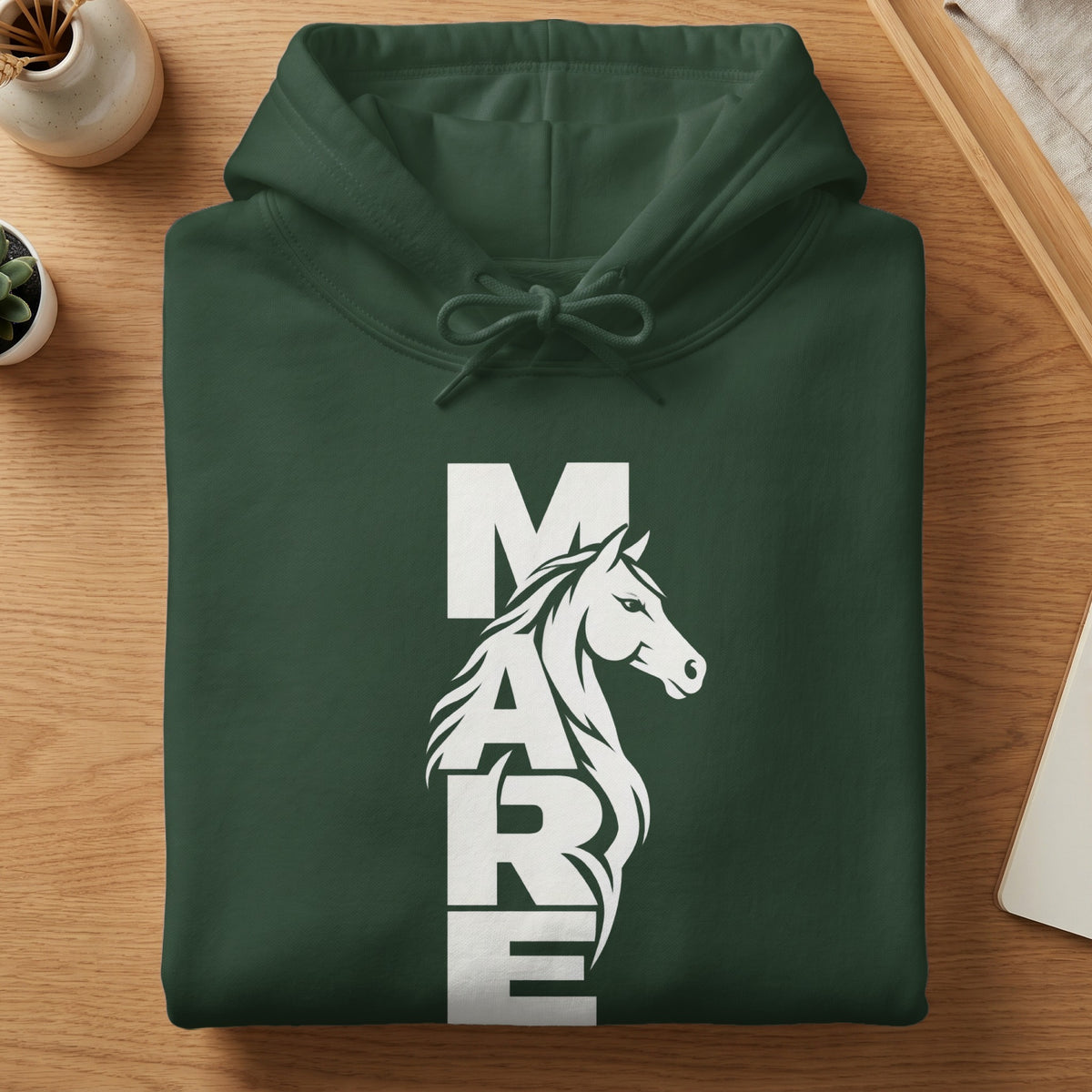 Folded dark green hooded sweatshirt with white block letters spelling MARE and a horse graphic.