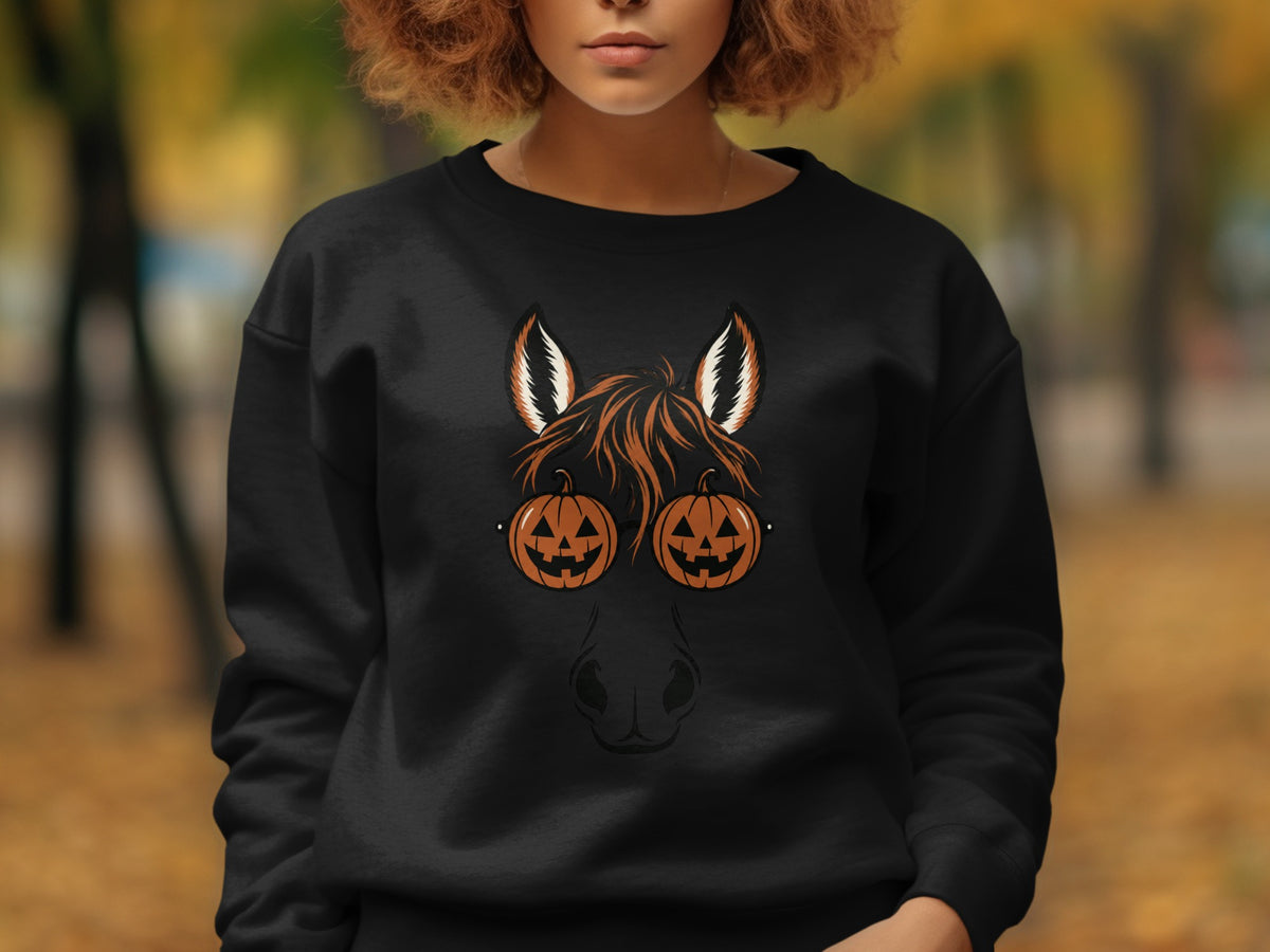 Black sweatshirt with a horse face design featuring pumpkin glasses and Halloween theme.