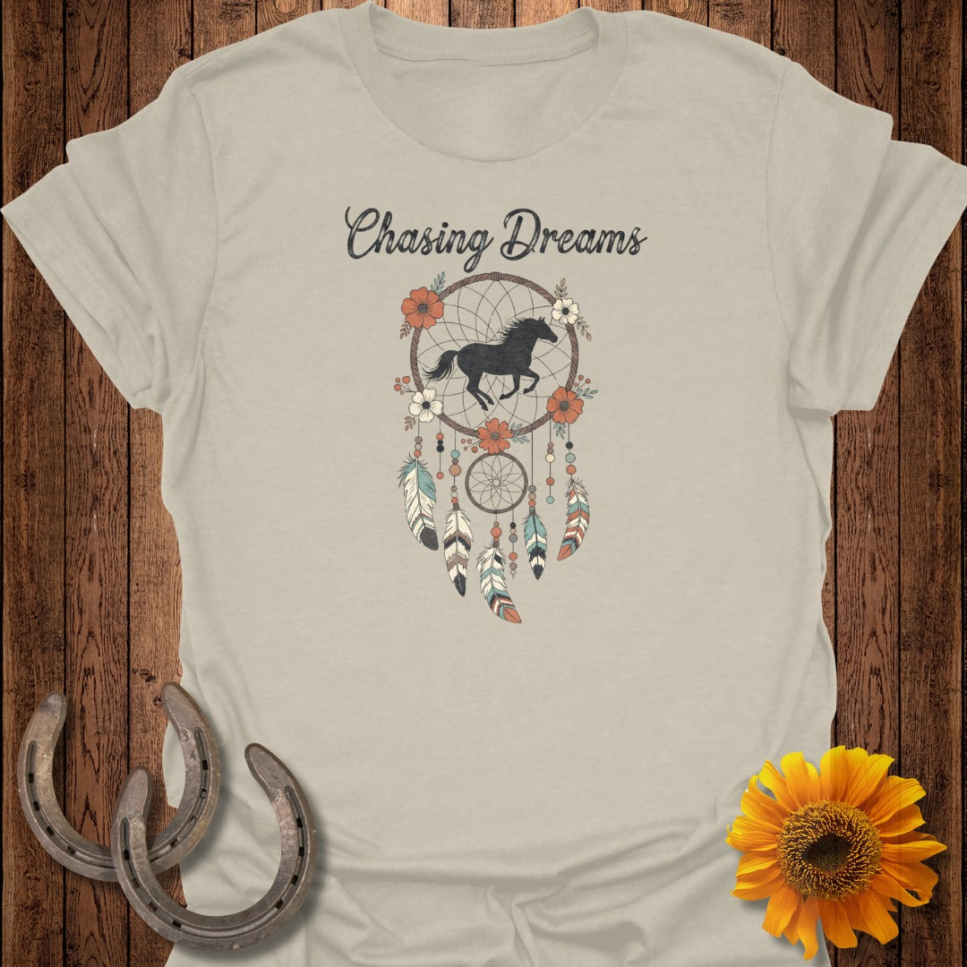 Light tan t-shirt with "Chasing Dreams" and a horse inside a dreamcatcher.