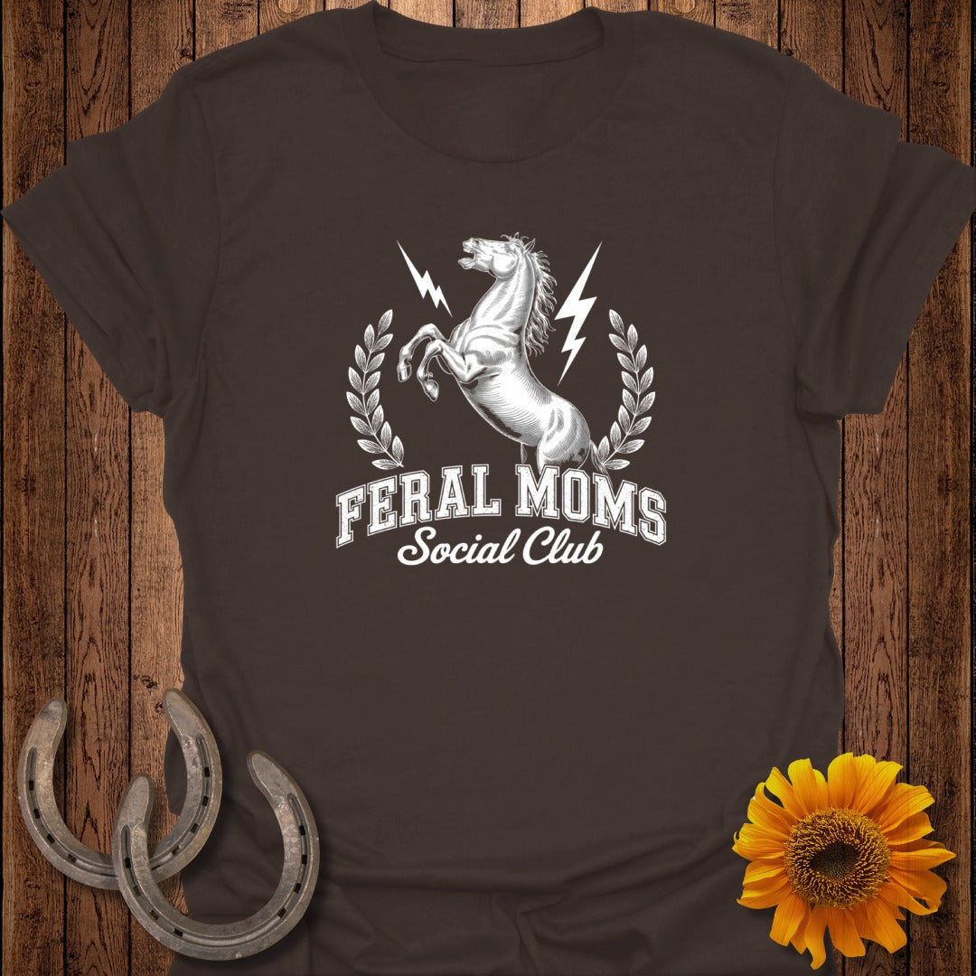 White horse with "Feral Moms Social Club" text on dark brown t-shirt.