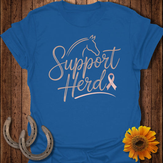 Blue t-shirt with "Support Herds" text, horse outline, and pink ribbon.
