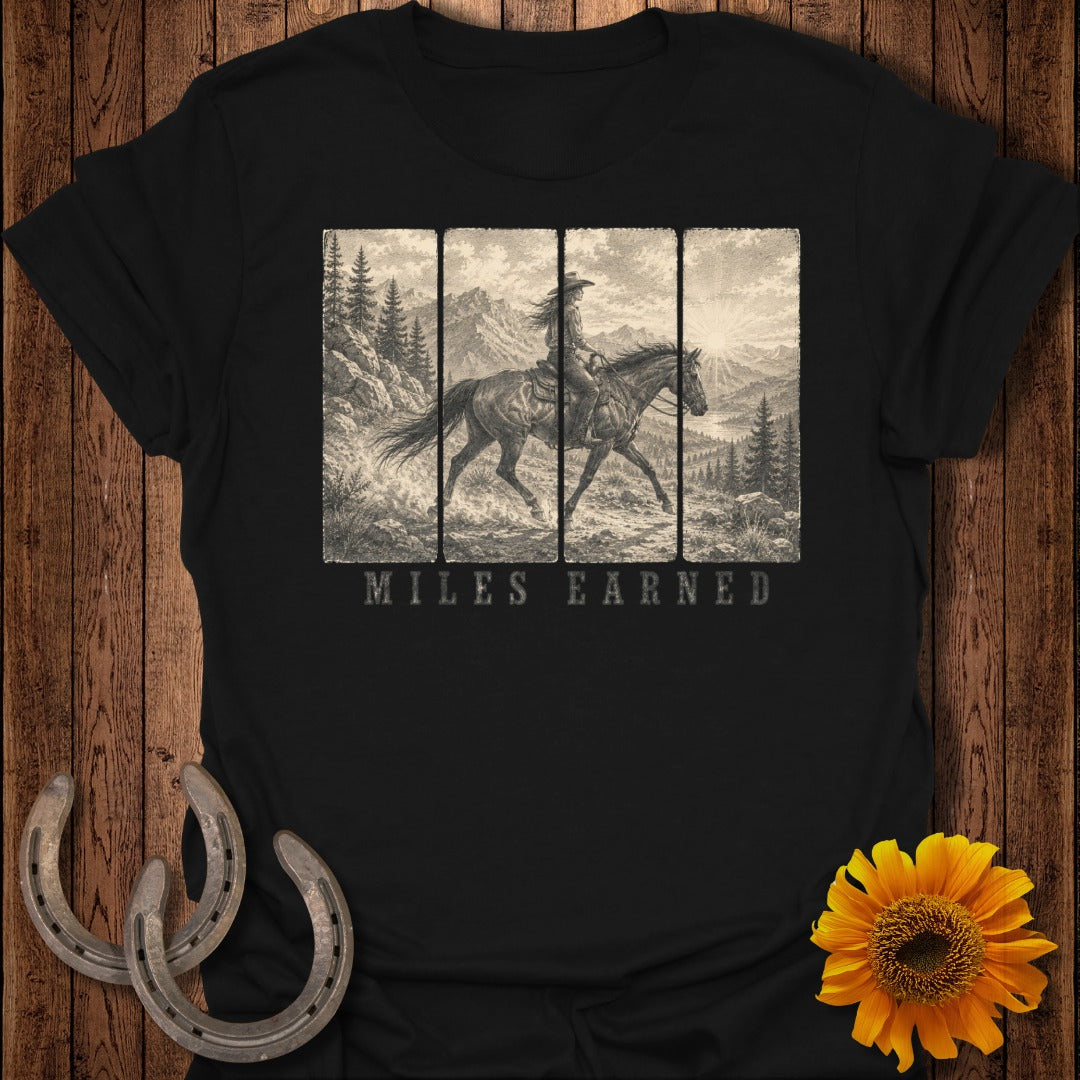 Black t-shirt with vintage equestrian scene, "Miles Earned" text.