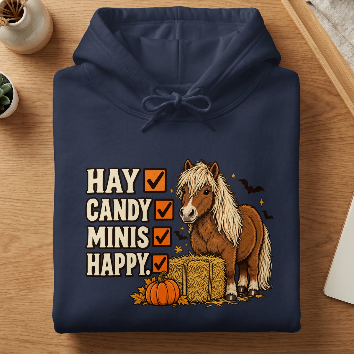 Dark navy hoodie with text "Hay Candy Minis Happy" and a brown pony.