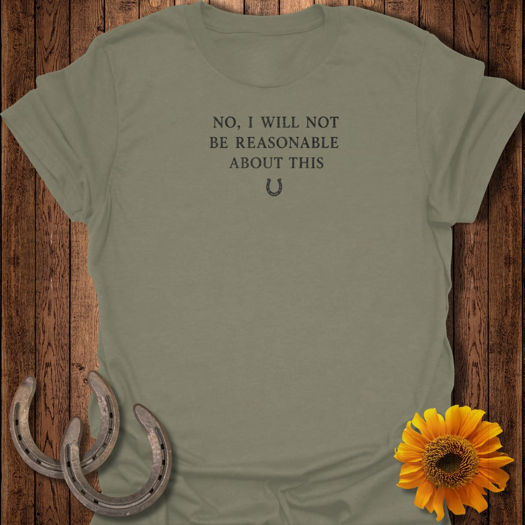 Olive green t-shirt with text "NO, I WILL NOT BE REASONABLE ABOUT THIS" and horseshoe graphic.