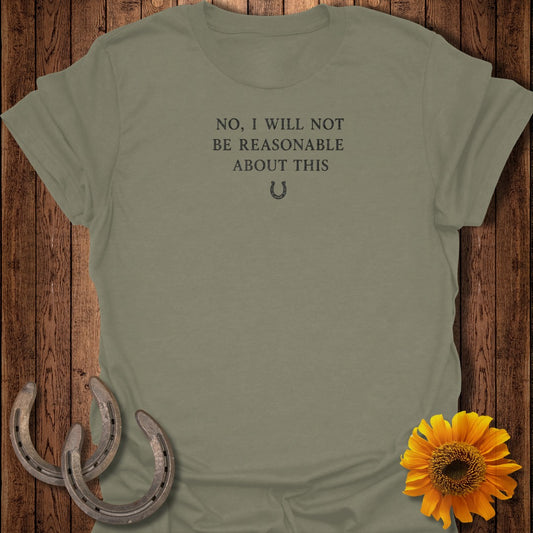 Olive green t-shirt with text "NO, I WILL NOT BE REASONABLE ABOUT THIS" and horseshoe graphic.