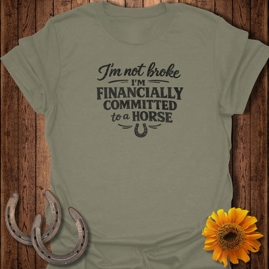 "I'm not broke, I'm financially committed to a horse" text with horseshoe.