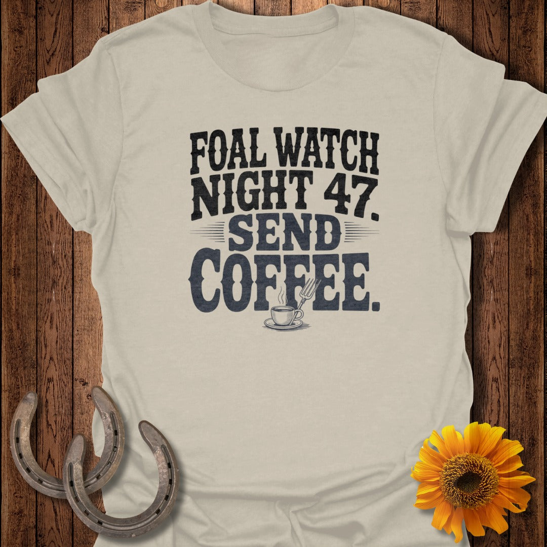 Cream t-shirt with "FOAL WATCH NIGHT 47. SEND COFFEE." text and a coffee cup.