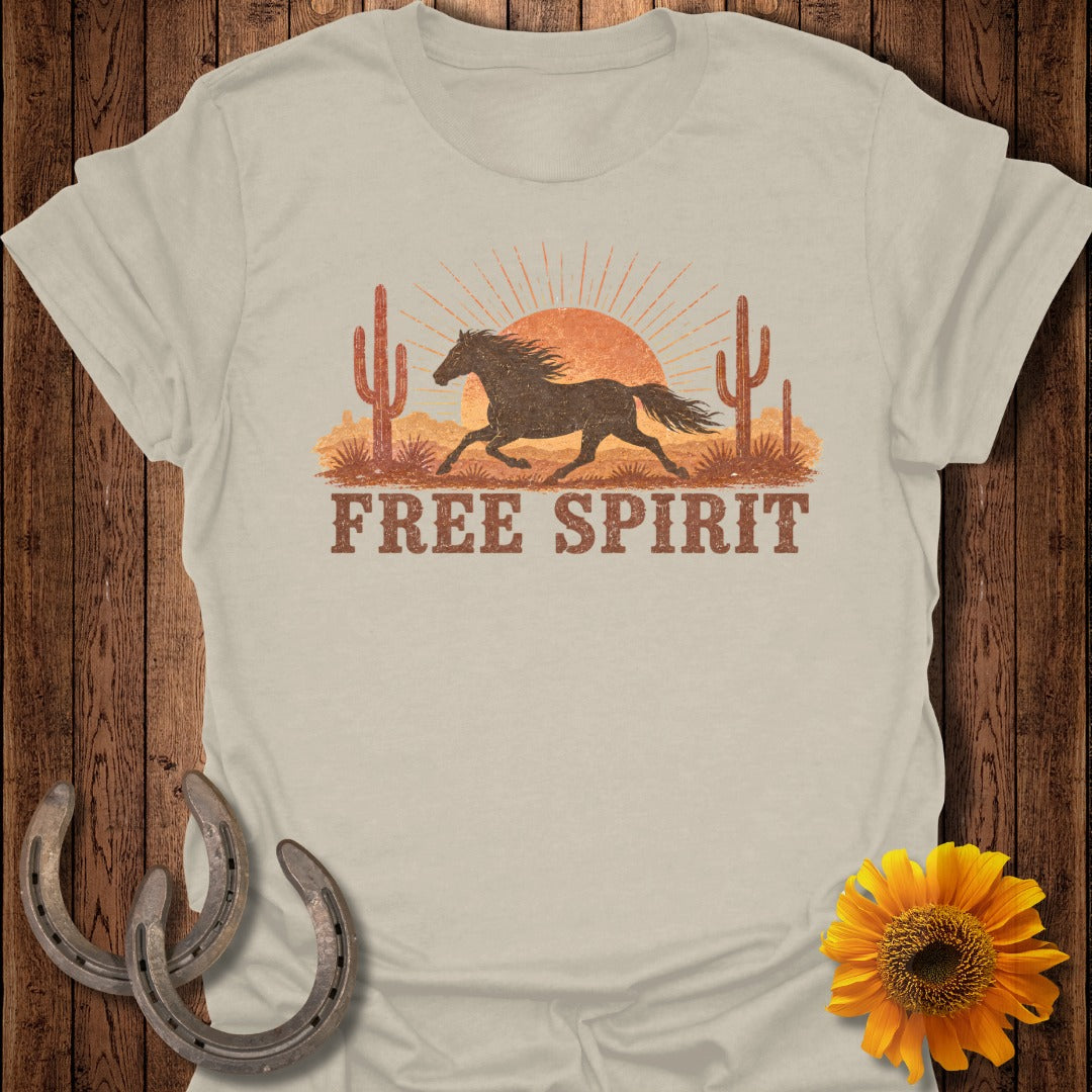 Light beige t-shirt with a desert scene and the words "FREE SPIRIT".