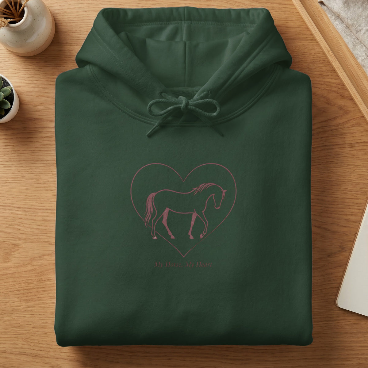 Dark green hoodie with pink horse silhouette inside a heart and text "My Horse, My Heart."