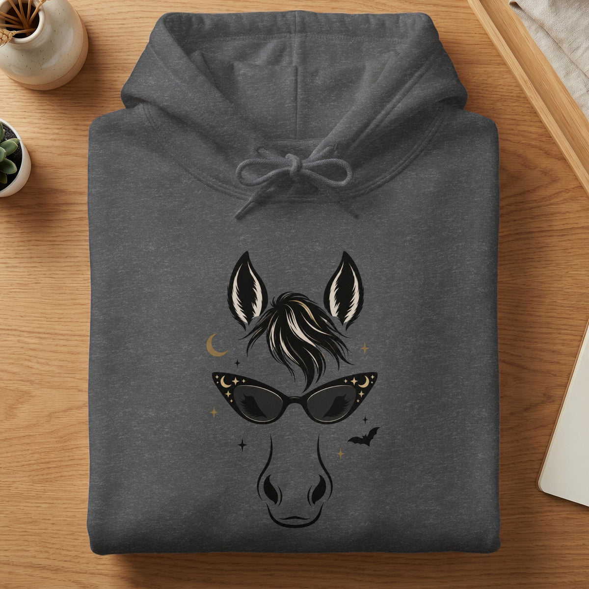Dark gray hoodie with a graphic of a horse wearing star-shaped sunglasses and a crescent moon.