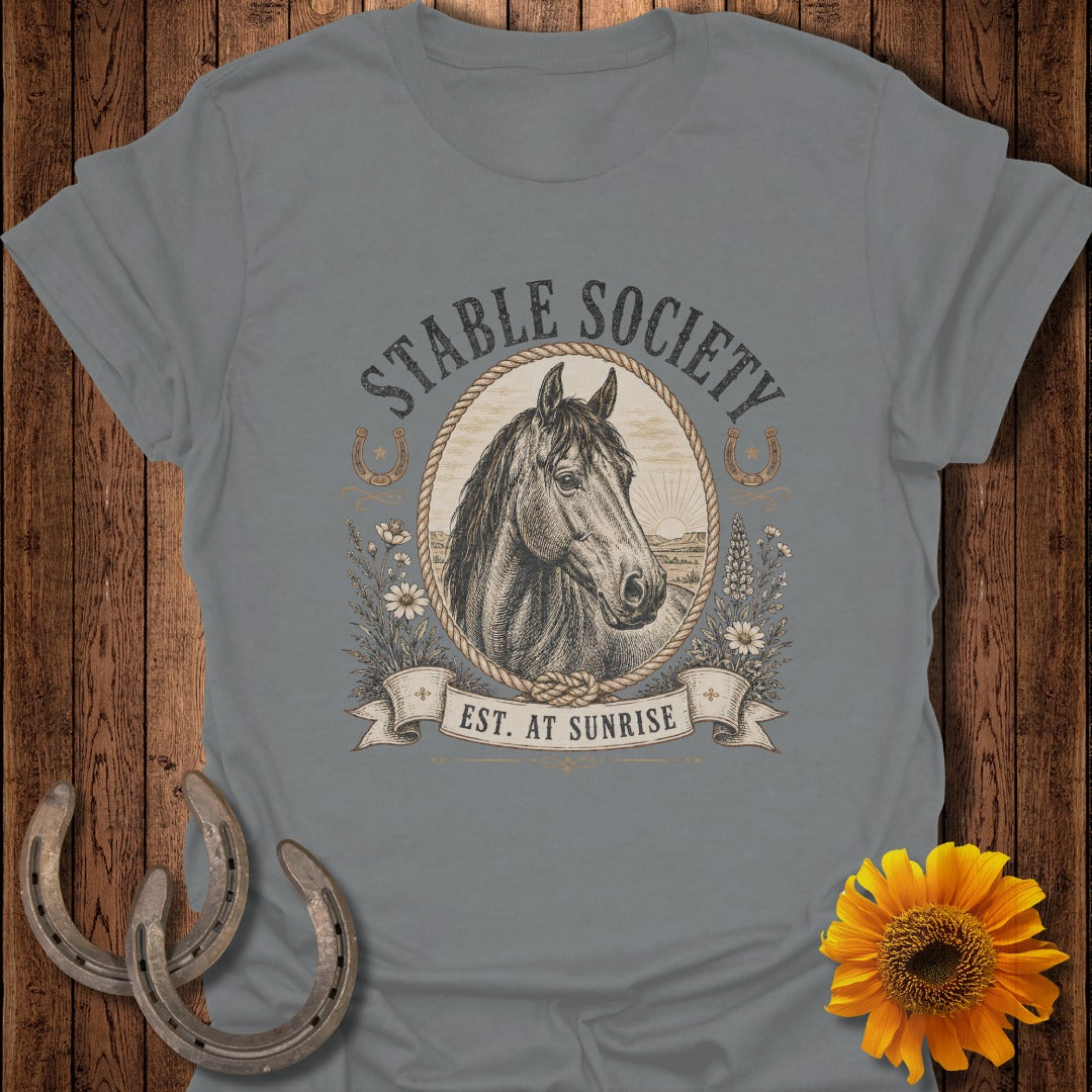 Gray t-shirt with a horse head illustration, "Stable Society" text, and "Est. at Sunrise" ribbon.