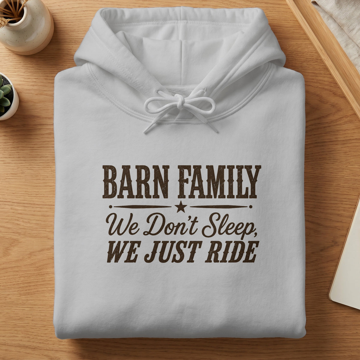 White hoodie with brown text: BARN FAMILY, We Don't Sleep, WE JUST RIDE.