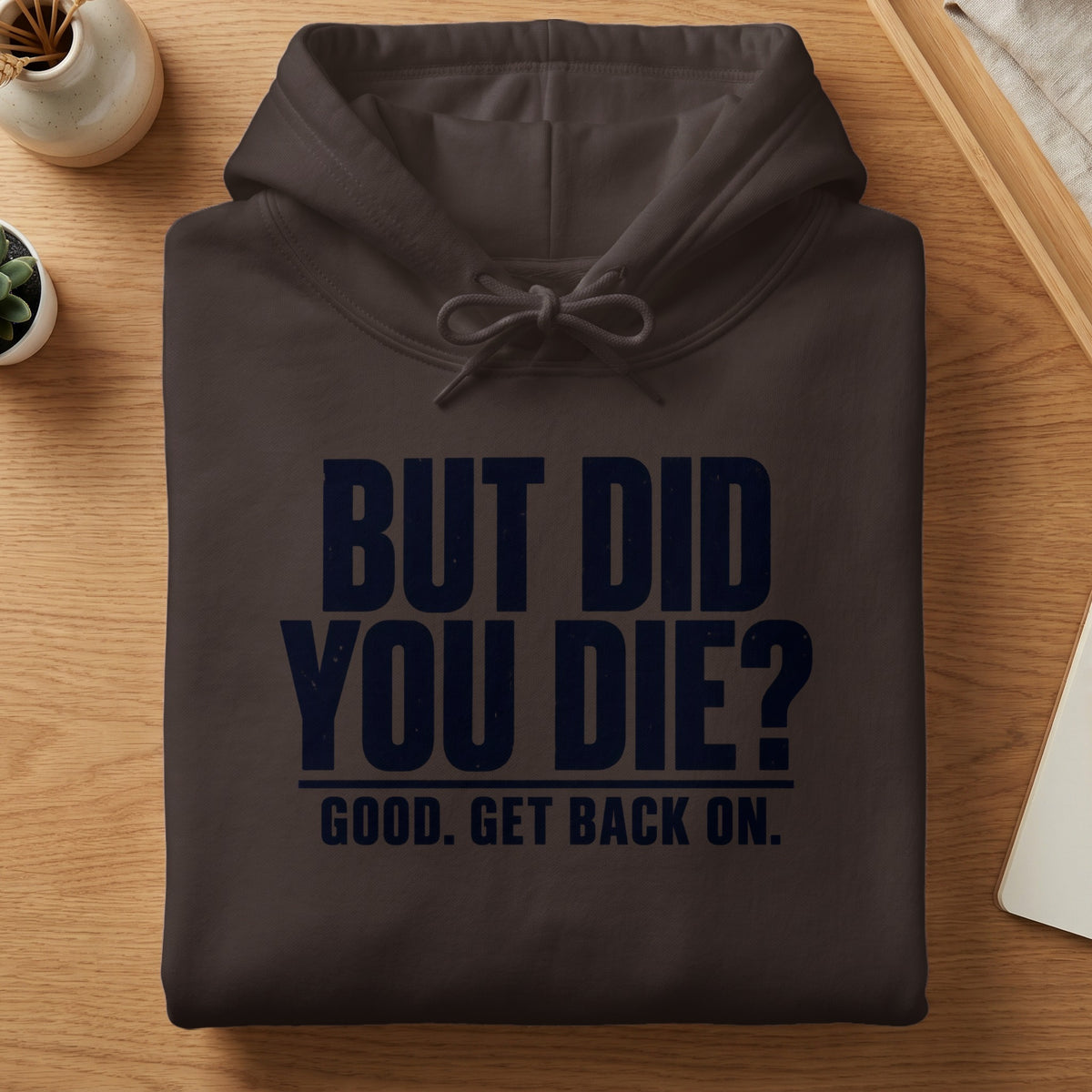 Dark grey hoodie with navy blue text "BUT DID YOU DIE? GOOD. GET BACK ON."