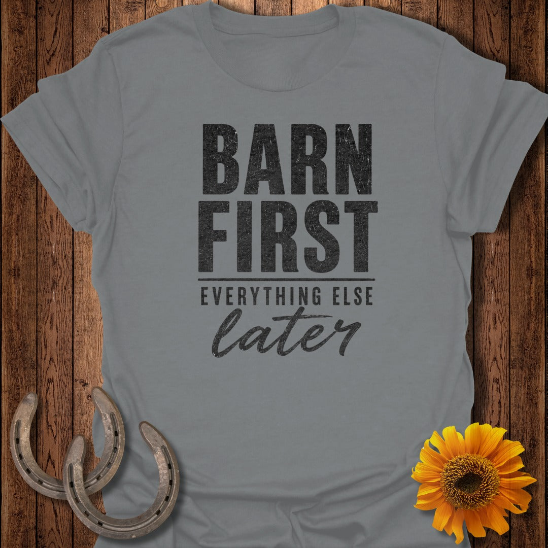 Gray t-shirt with "Barn First, Everything Else Later" text and horseshoes.