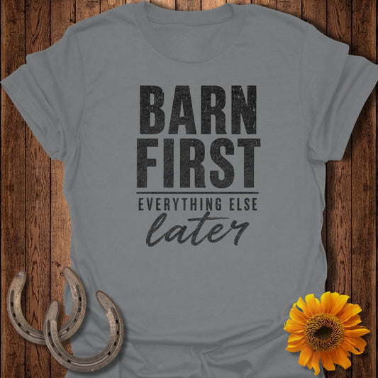 Gray t-shirt with "Barn First, Everything Else Later" text and horseshoes.