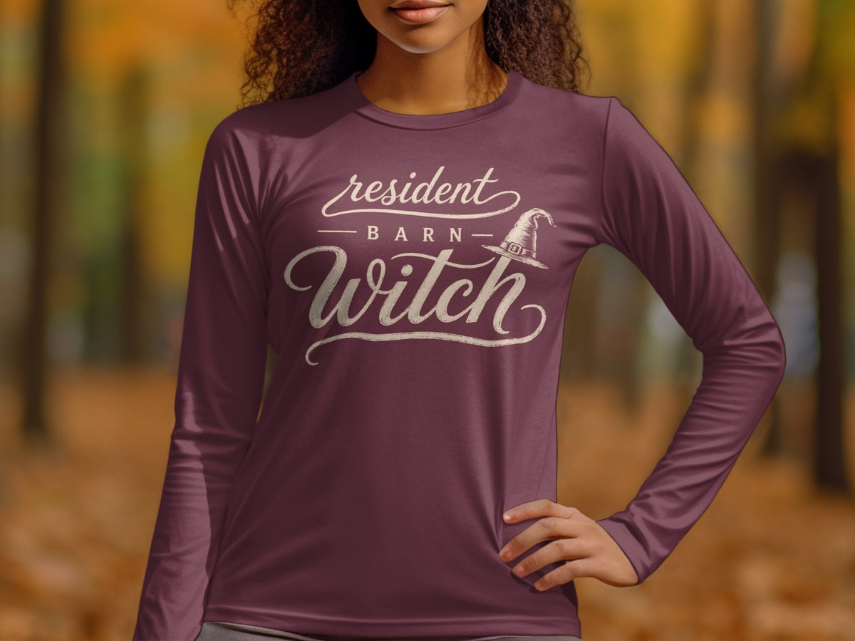 Maroon long sleeve shirt with "Resident Barn Witch" text and witch hat graphic.