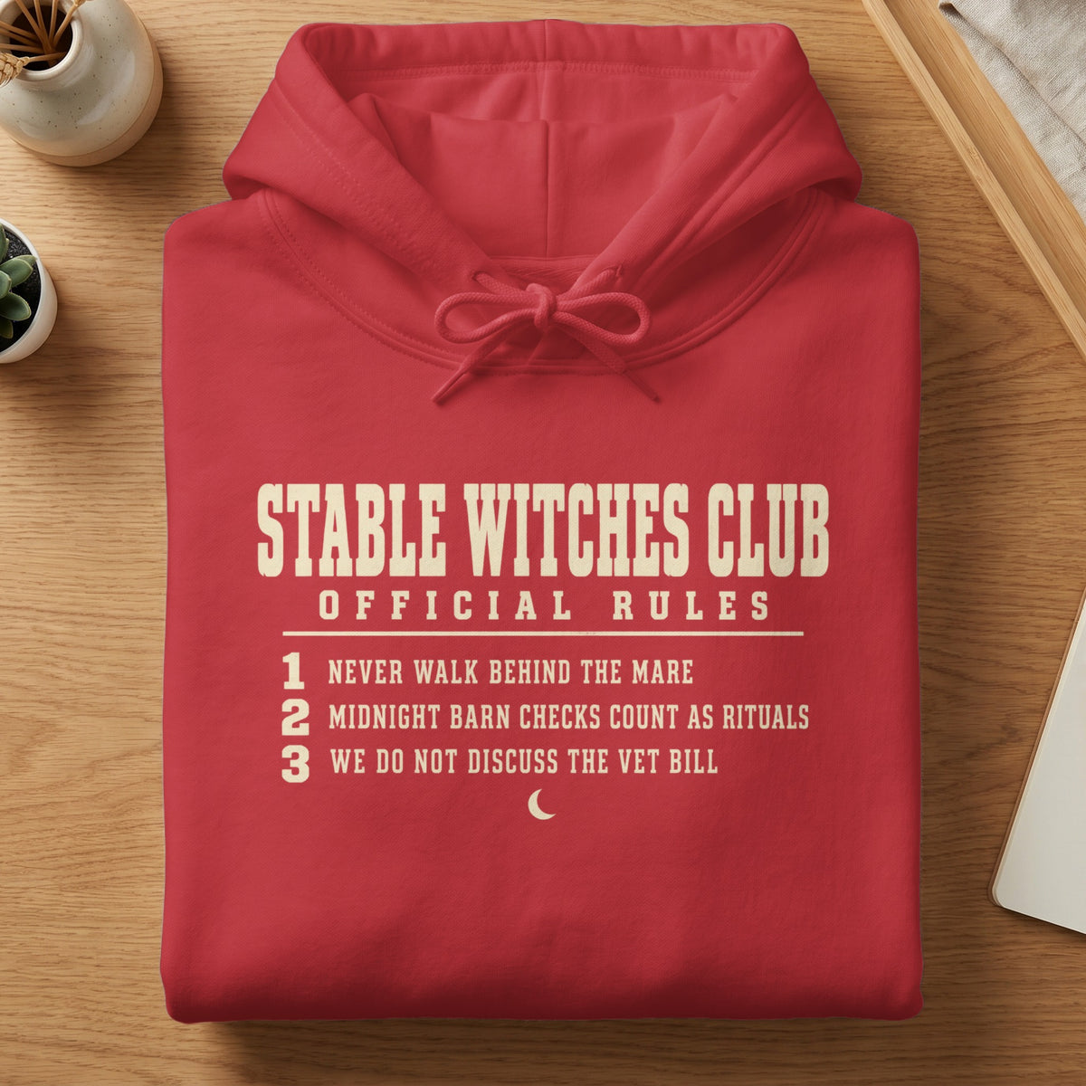Red hoodie with "Stable Witches Club Official Rules" and three numbered rules.
