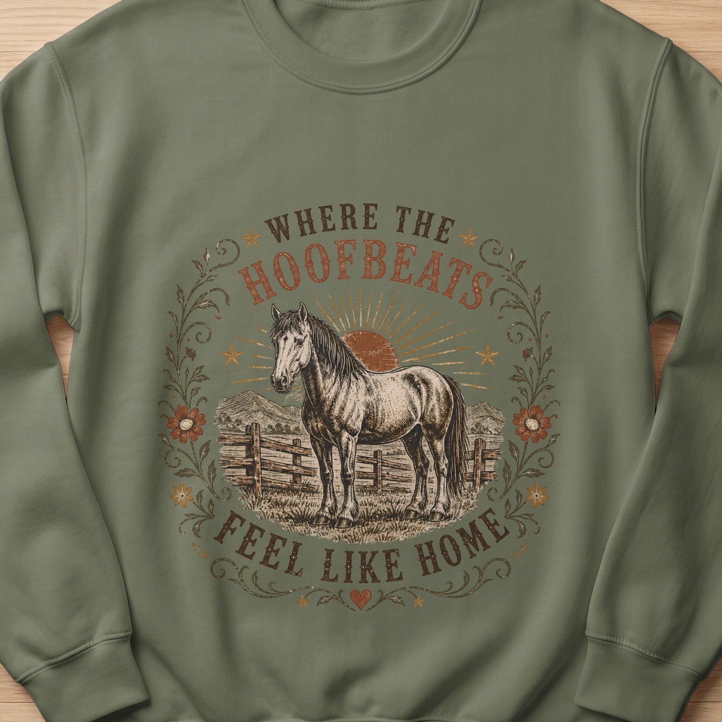 Horse graphic with text "Where the Hoofbeats Feel Like Home" on a green sweatshirt.