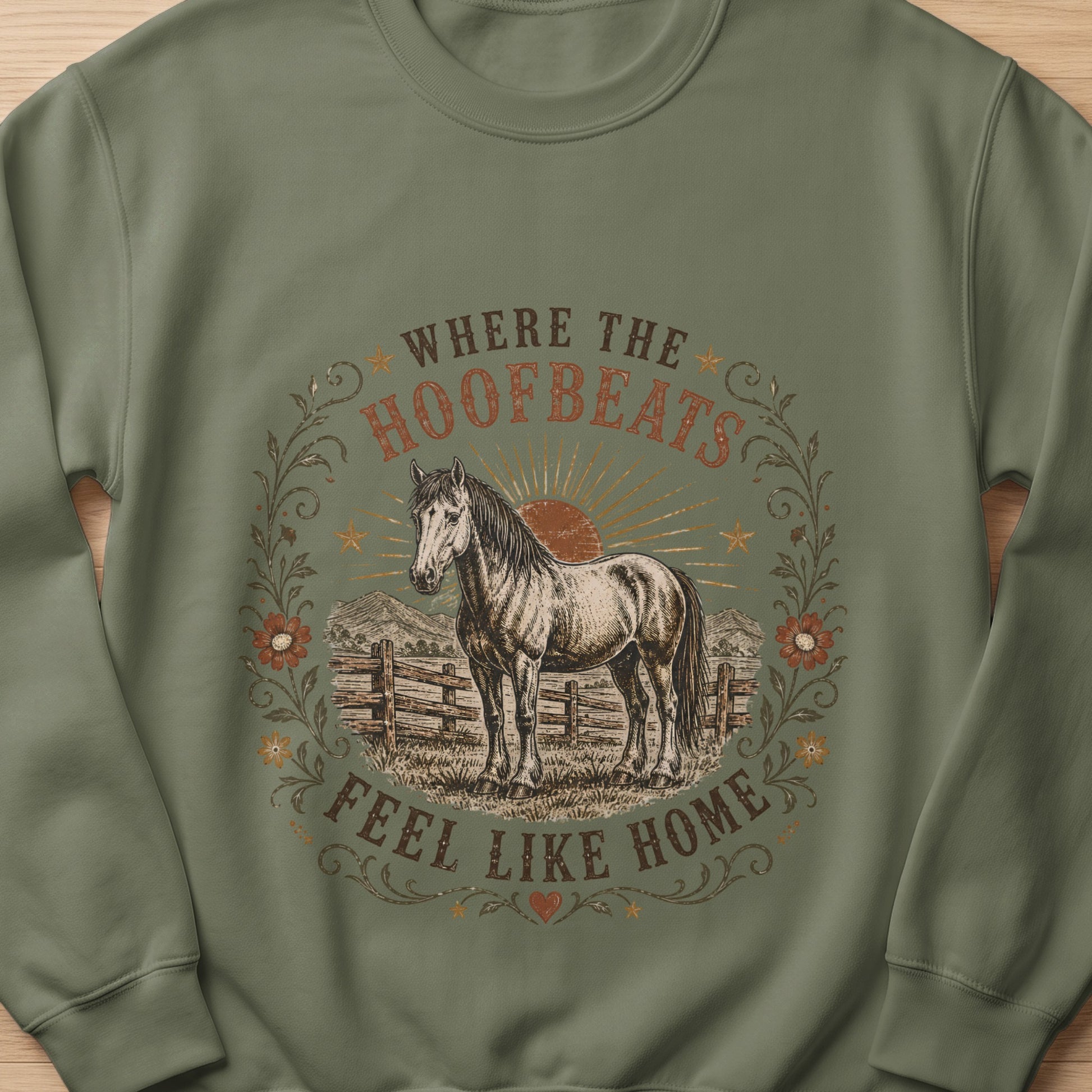 Horse graphic with text "Where the Hoofbeats Feel Like Home" on a green sweatshirt.