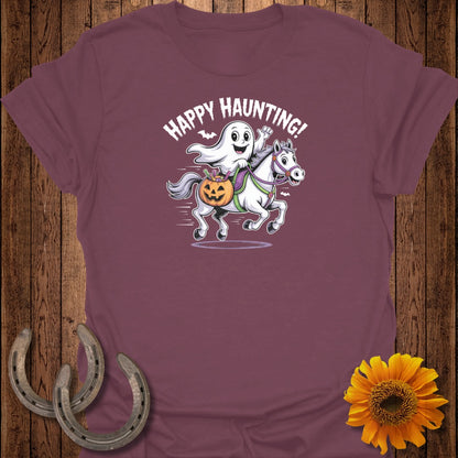 Ghost riding a horse with pumpkin basket and text "Happy Haunting!".
