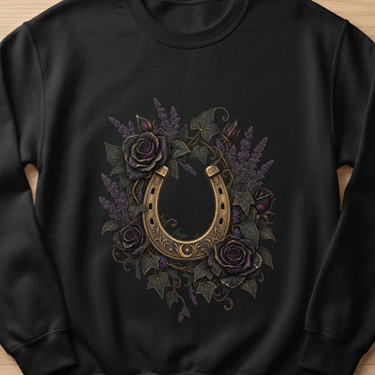 Black sweatshirt with ornate golden horseshoe and dark purple roses.