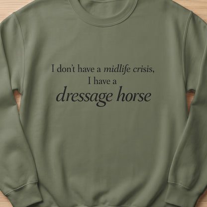 Olive green sweatshirt with black text: "I don't have a midlife crisis, I have a dressage horse."