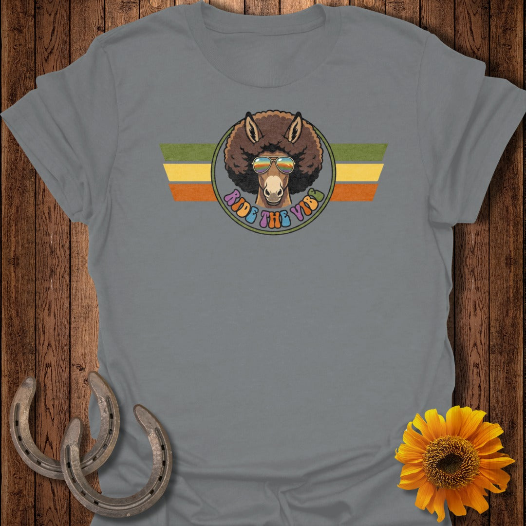Donkey wearing sunglasses with text "Ride the Vibes" on a gray t-shirt.