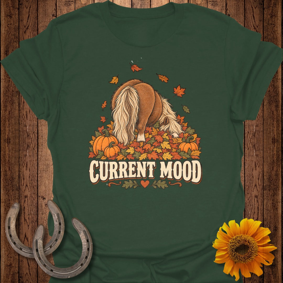 Green t-shirt with a pony in autumn leaves and pumpkins, text reads "Current Mood".