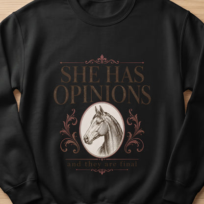 Black sweatshirt with "She Has Opinions" and horse graphic.