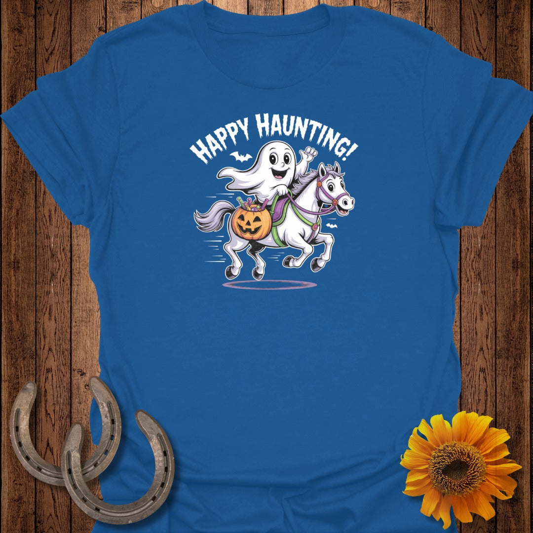 Blue t-shirt with a ghost riding a white horse with a pumpkin basket.