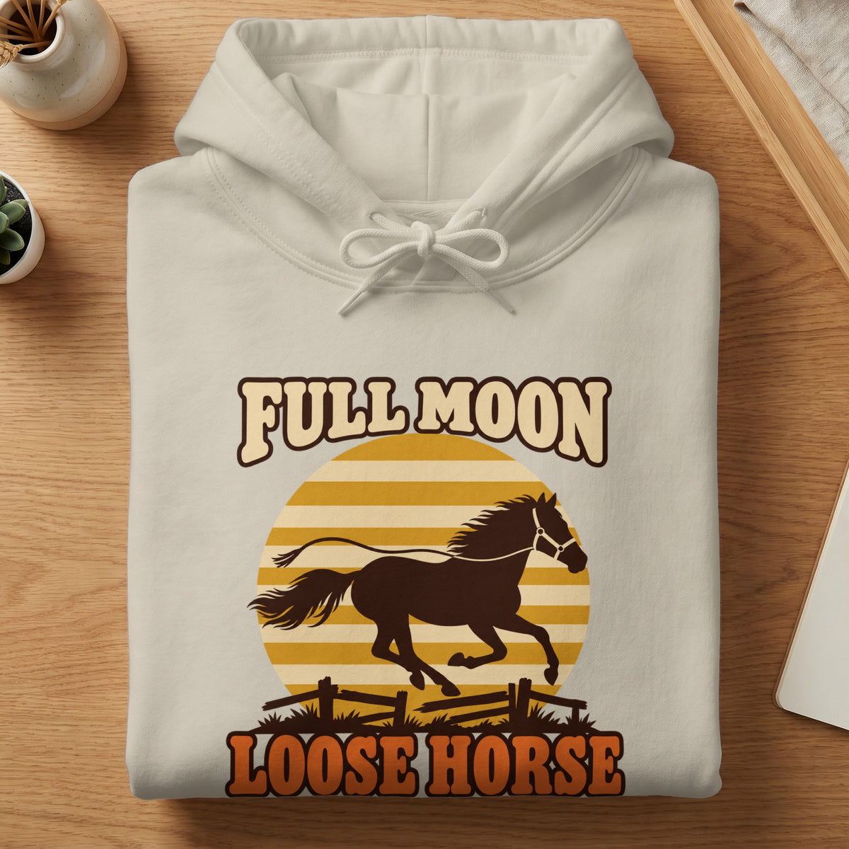 Cream hoodie with "Full Moon Loose Horse" text and running horse graphic.
