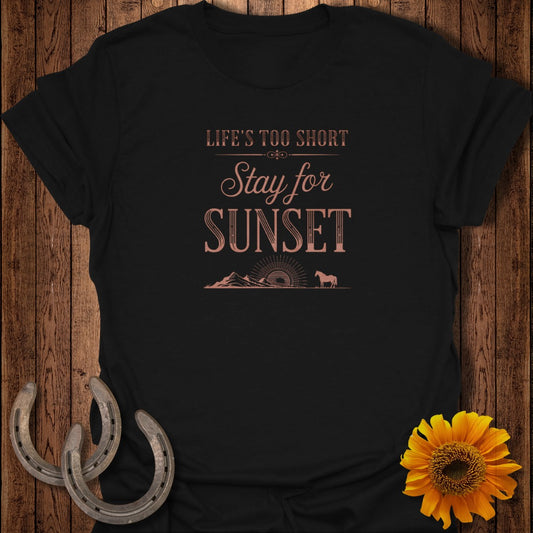 Black t-shirt with text "LIFE'S TOO SHORT Stay for SUNSET" and mountain graphic.