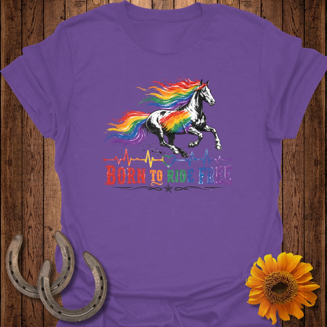Purple t-shirt with a rainbow-maned horse and "Born to Ride Free" text.
