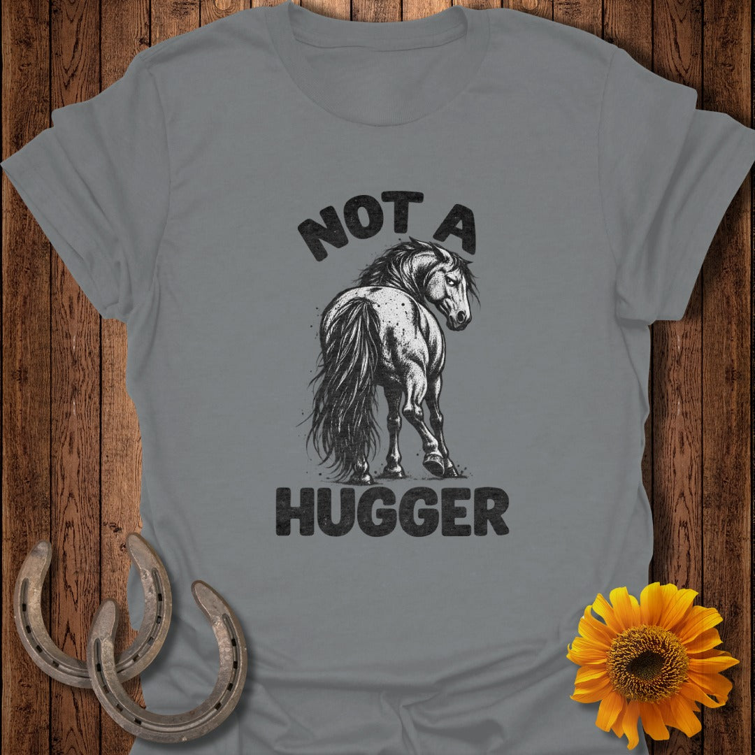 A gray t-shirt featuring a sketch of a horse looking back, with the text NOT A HUGGER.