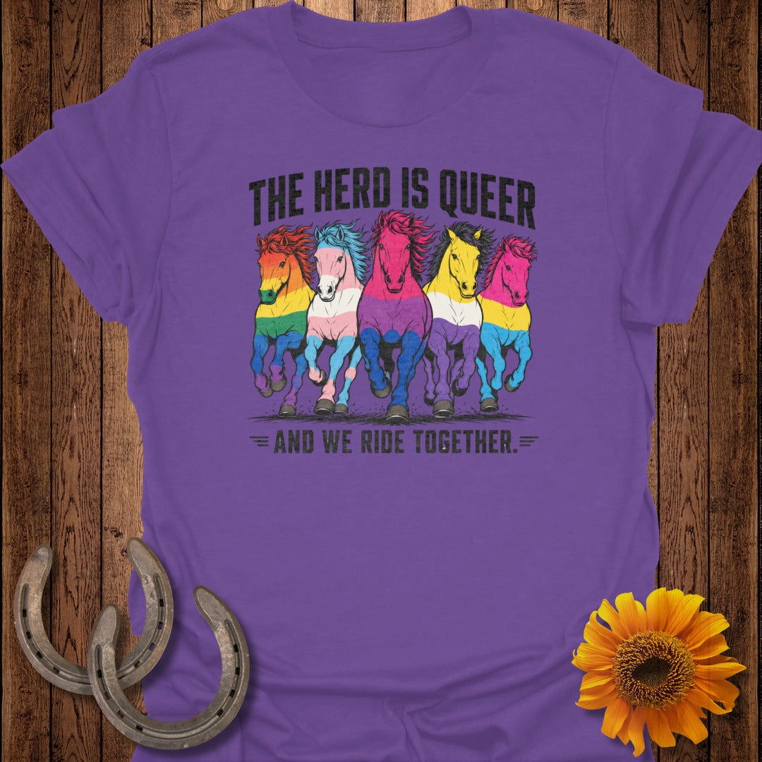 Purple t-shirt with rainbow horses and text "The Herd is Queer and We Ride Together."