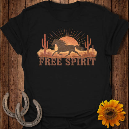 Black t-shirt graphic with running horse, desert, sun, and "FREE SPIRIT" text.