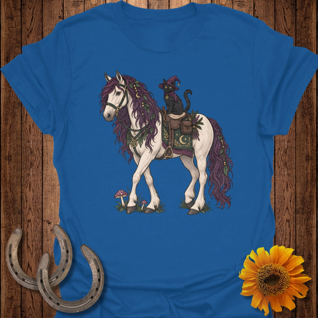 White horse with a black cat wearing a witch hat riding on its back.