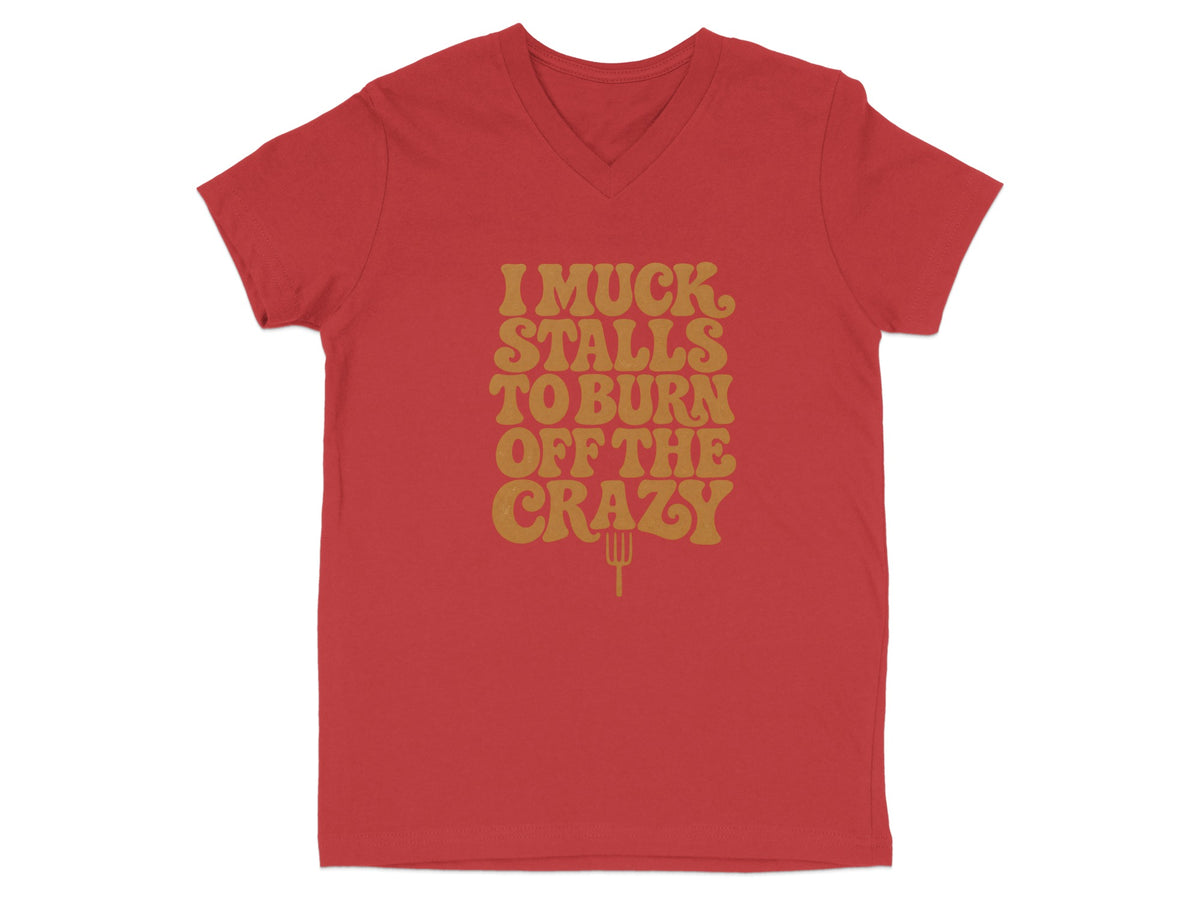Red v-neck t-shirt with gold text "I MUCK STALLS TO BURN OFF THE CRAZY"