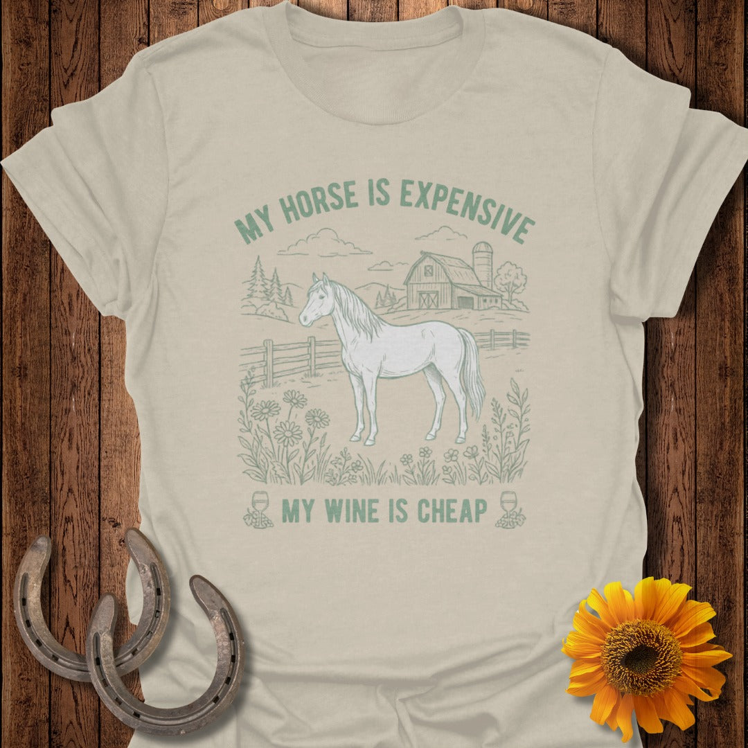 T-shirt with a drawing of a horse in a field and the text "My horse is expensive, my wine is cheap."
