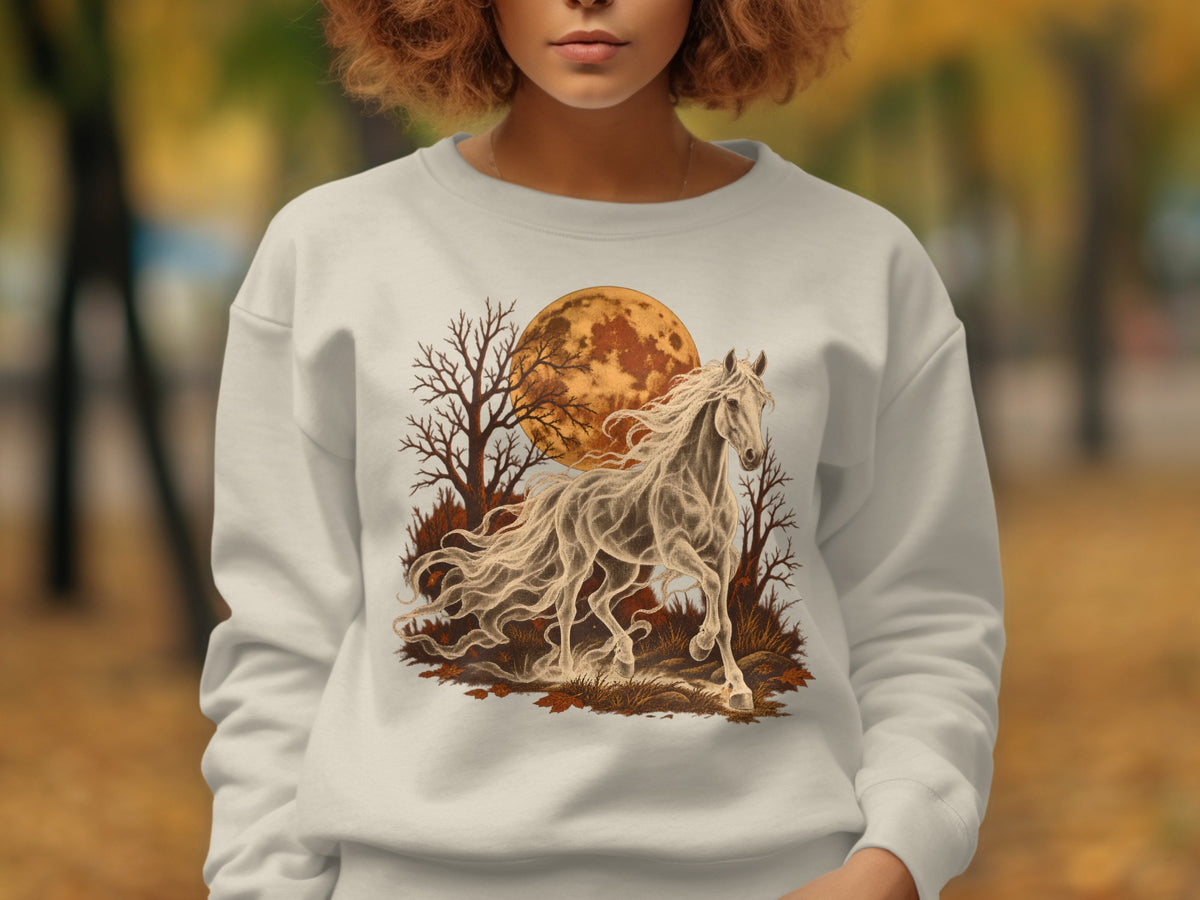 Ghostly white horse runs under a large orange moon with bare trees.