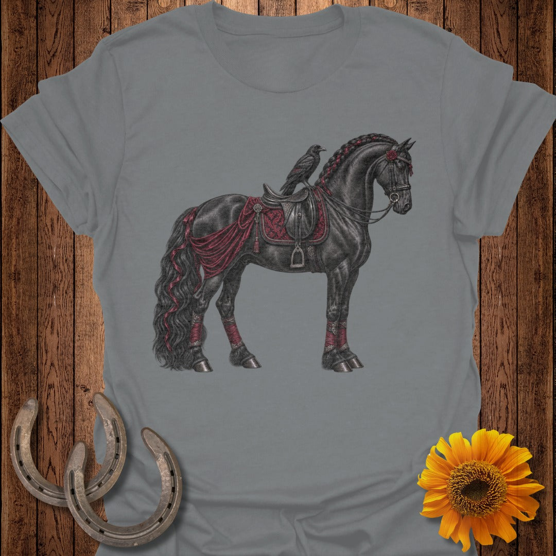 Black horse with a raven on its back, adorned with red saddle and leg wraps.