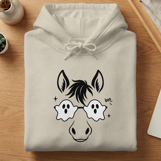 Beige hoodie with a black horse face graphic wearing ghost-shaped glasses.