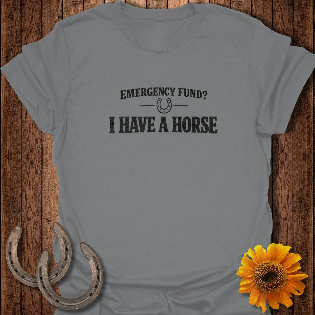 Grey t-shirt with "EMERGENCY FUND? I HAVE A HORSE" text and a horseshoe graphic.