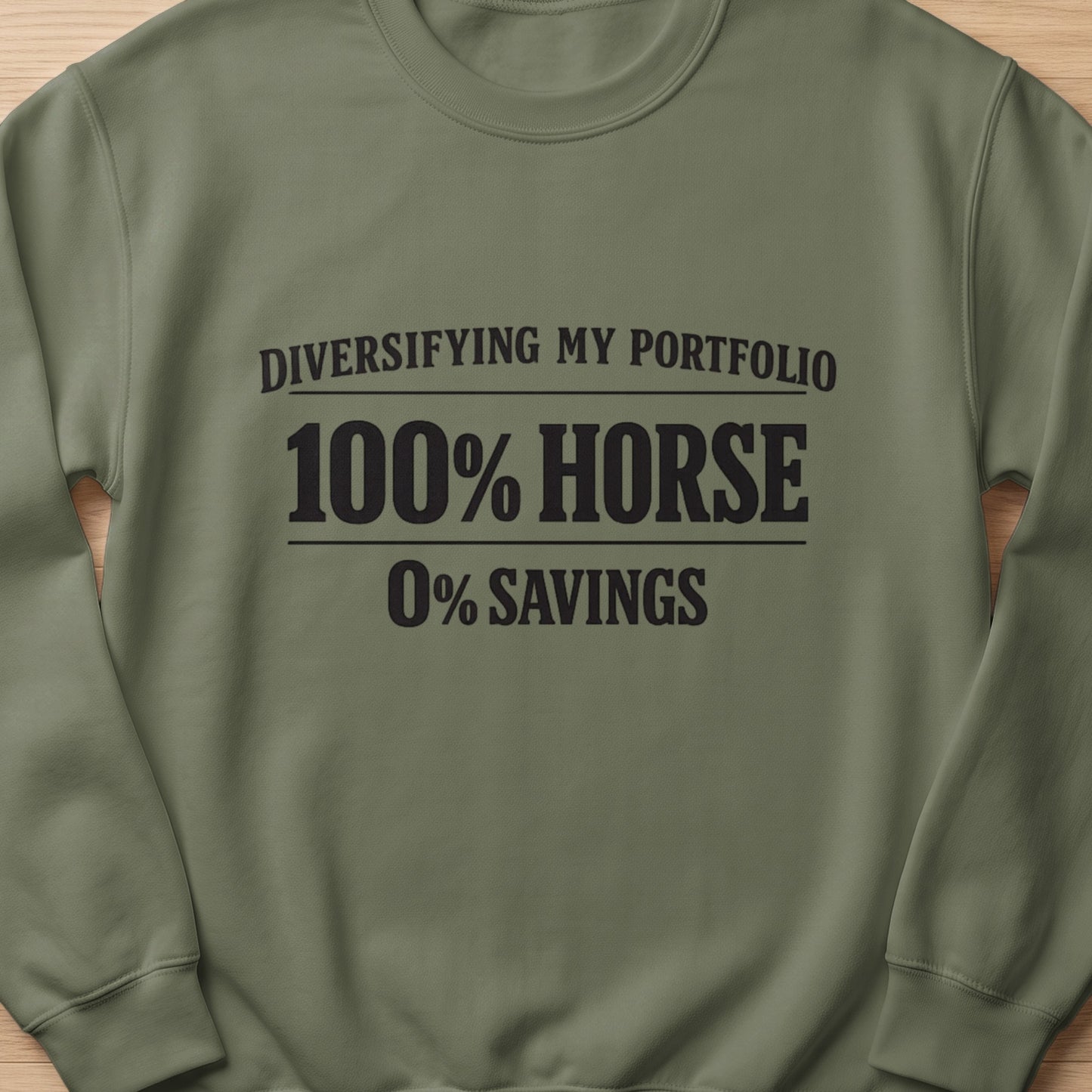 Green sweatshirt with "Diversifying My Portfolio, 100% Horse, 0% Savings" text.