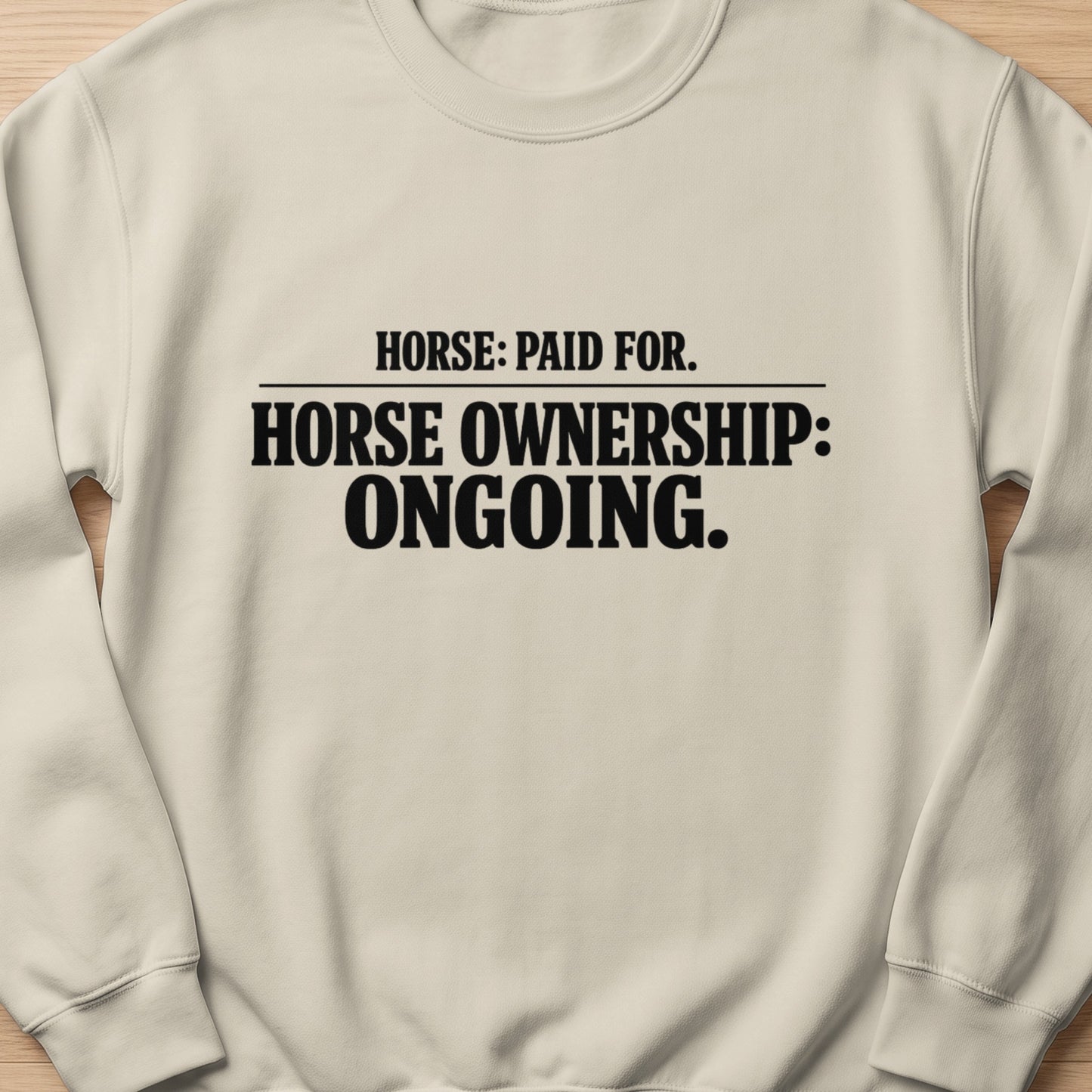 Cream sweatshirt with black text: Horse: Paid For. Horse Ownership: Ongoing.