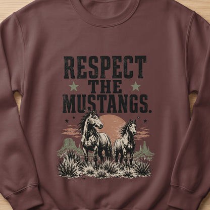 Two mustangs stand in a desert landscape with "Respect the Mustangs" text above.