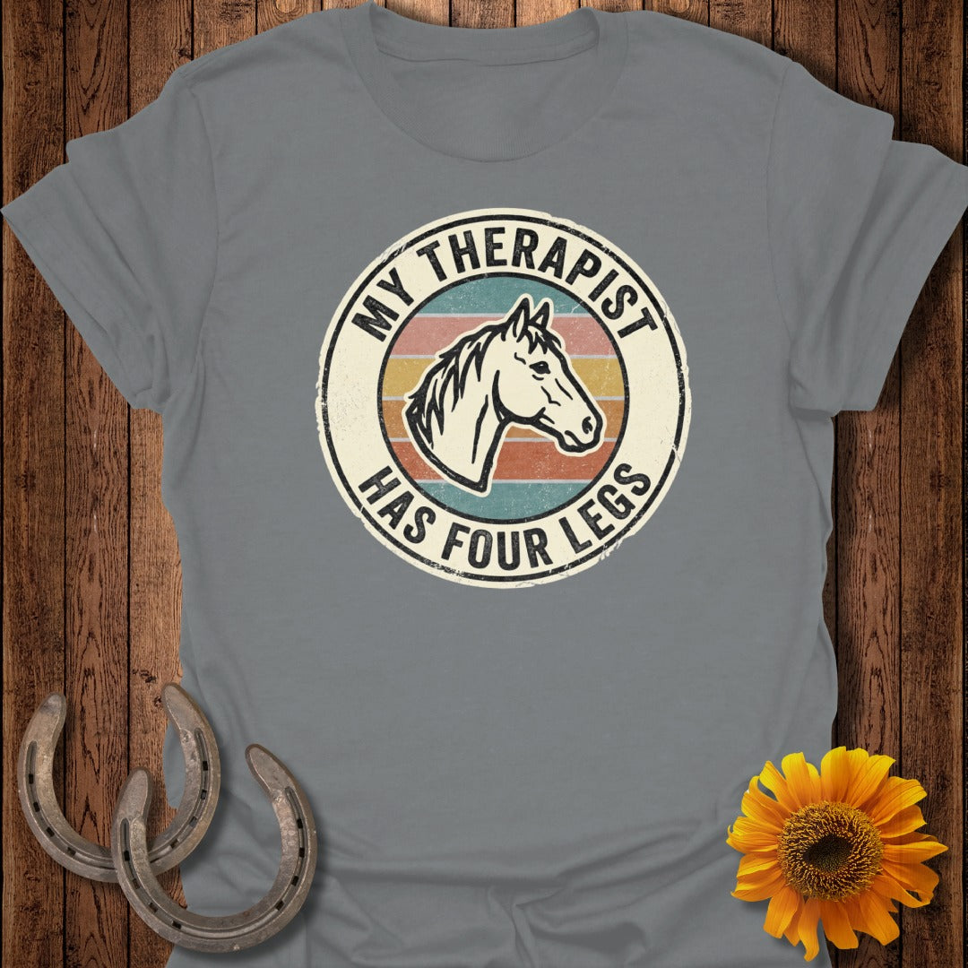 Grey t-shirt with "MY THERAPIST HAS FOUR LEGS" and a horse head graphic.