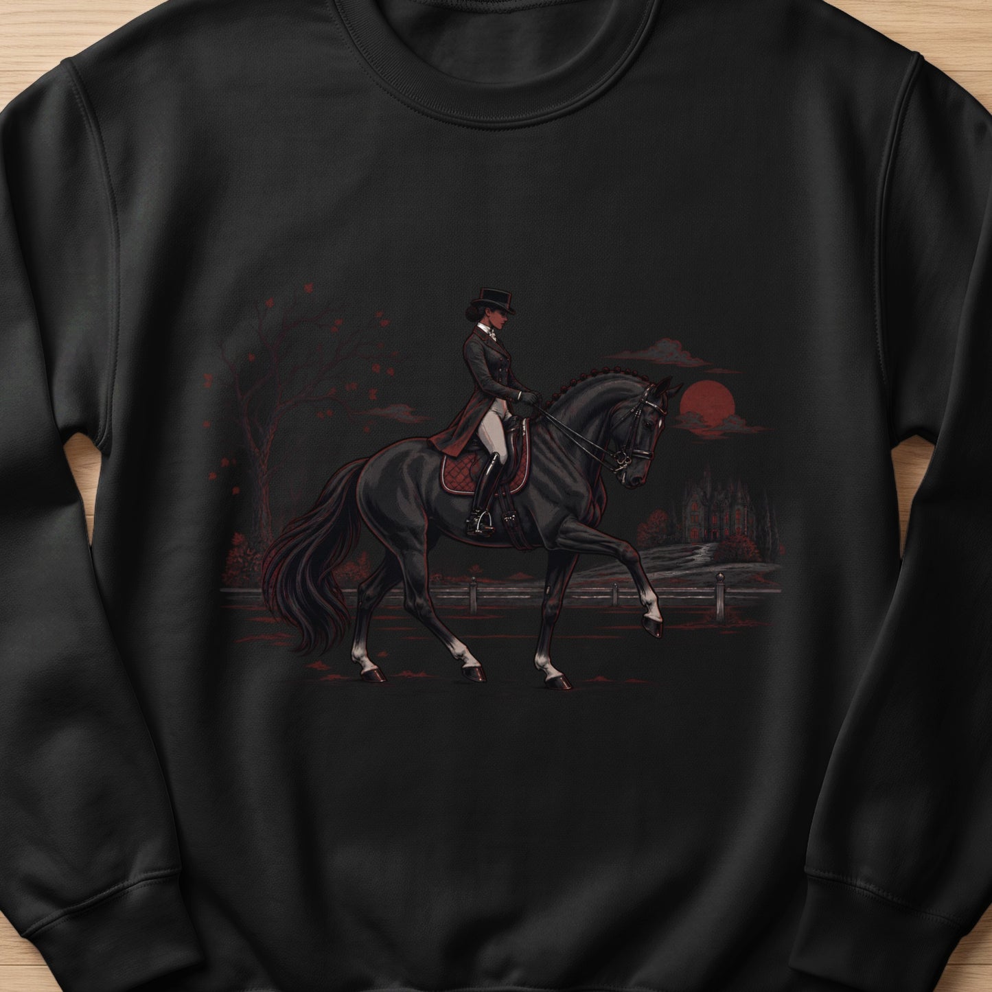 Black sweatshirt with a dressage rider on a black horse and a gothic manor.