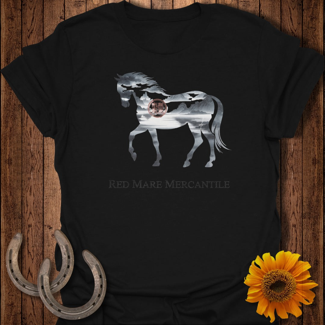 Black t-shirt with horse silhouette filled with mountain landscape and Red Mare Mercantile text.
